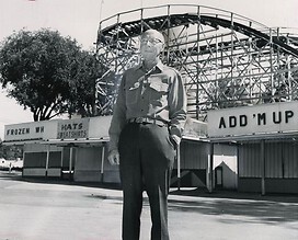 This is Parker Beach. He owned the park until his retirement. Behind him is the crazy wooden Rollercoaster. 