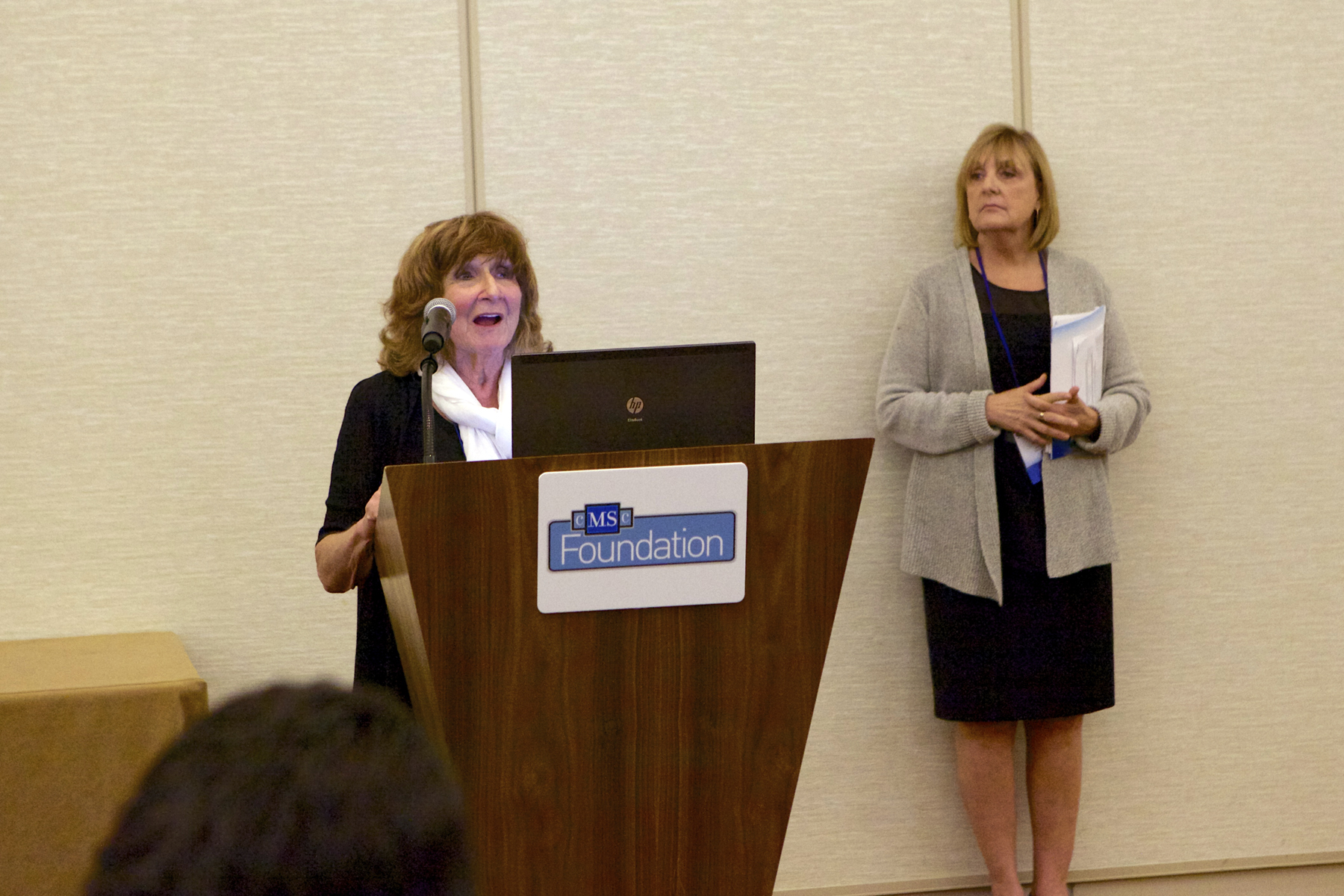 June Halper introducing Judy Katterhenrich, Executive Director of the Foundation of CMSC, at the FCMSC luncheon