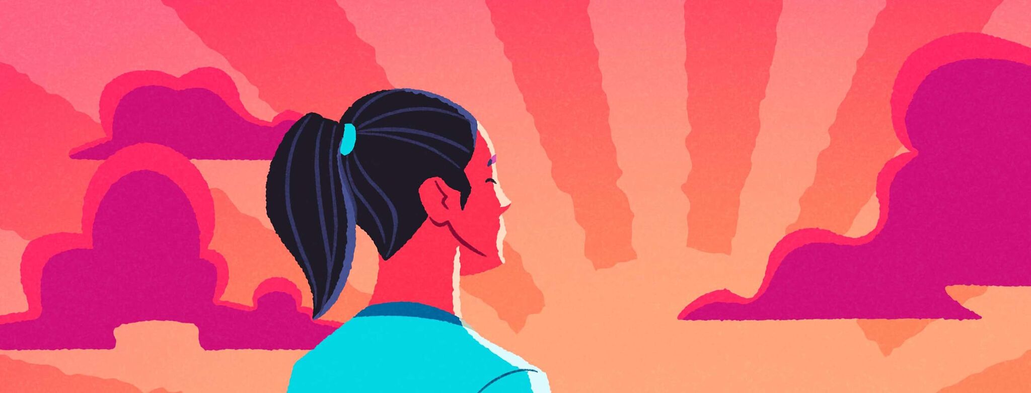 woman stands looking at the summer sunset