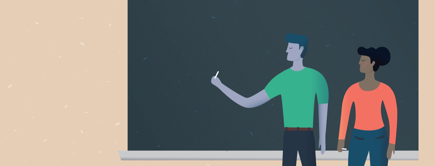 A man is getting ready to write something on a chalkboard as a woman looks over his shoulder.