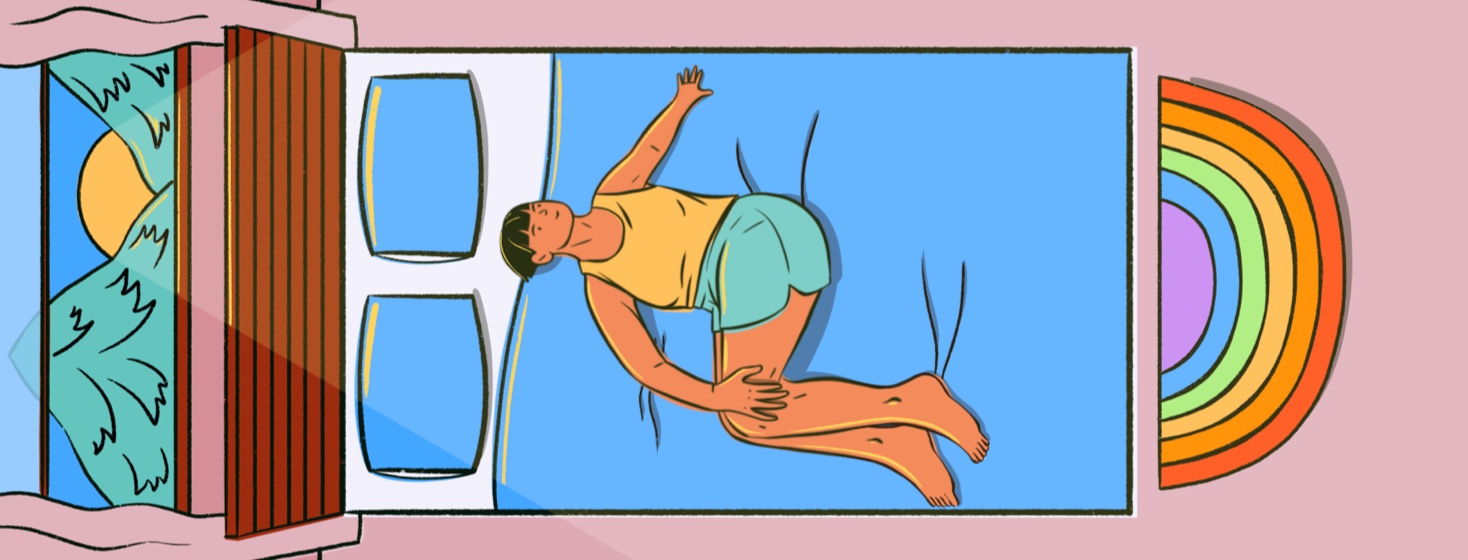 A woman lays in bed stretching