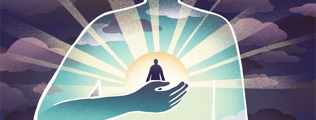 A person stands inside a silhouette of a body, facing bright and glowing rays of light